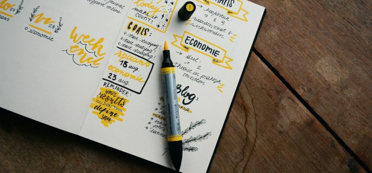 Keyword Research Basics: Finding What Your Customers Search For Handwritten planning notes and a highlighter on a wooden table